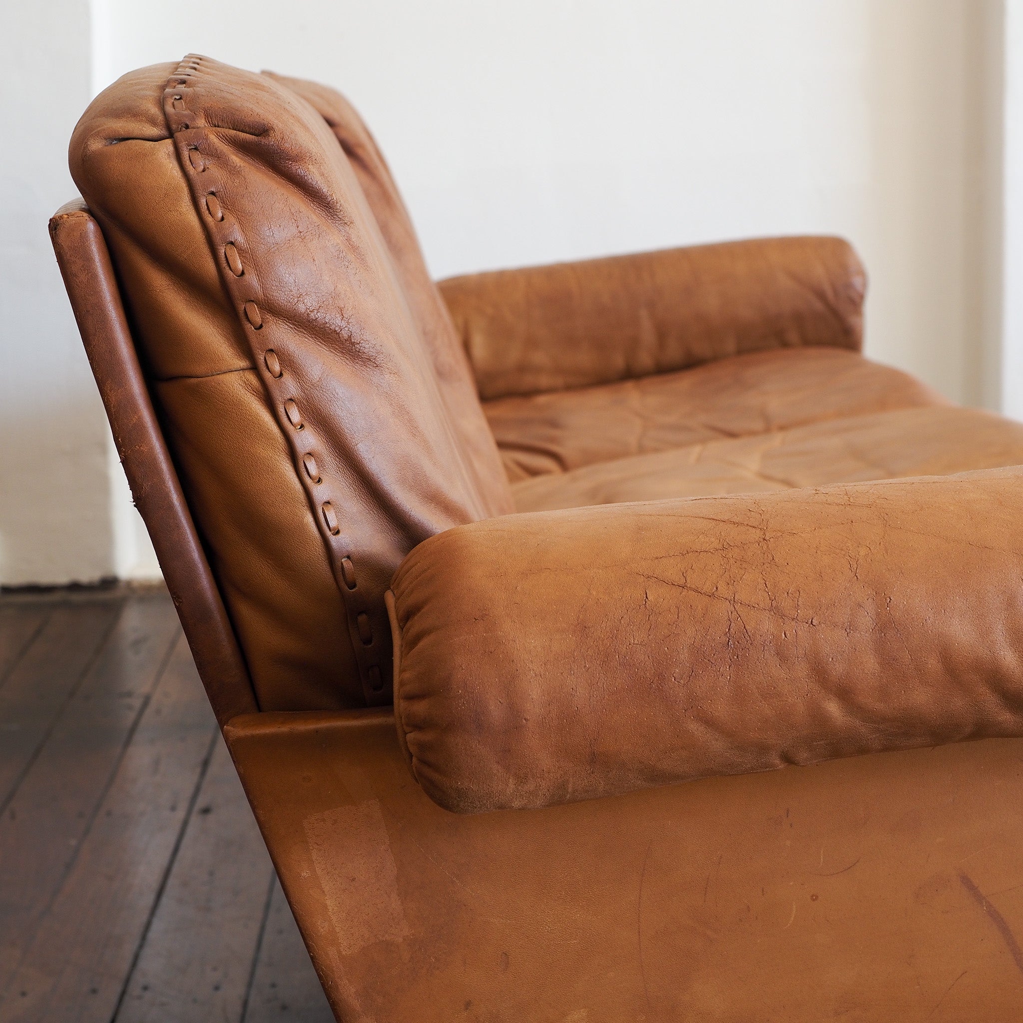 Leather sofa side arm detail