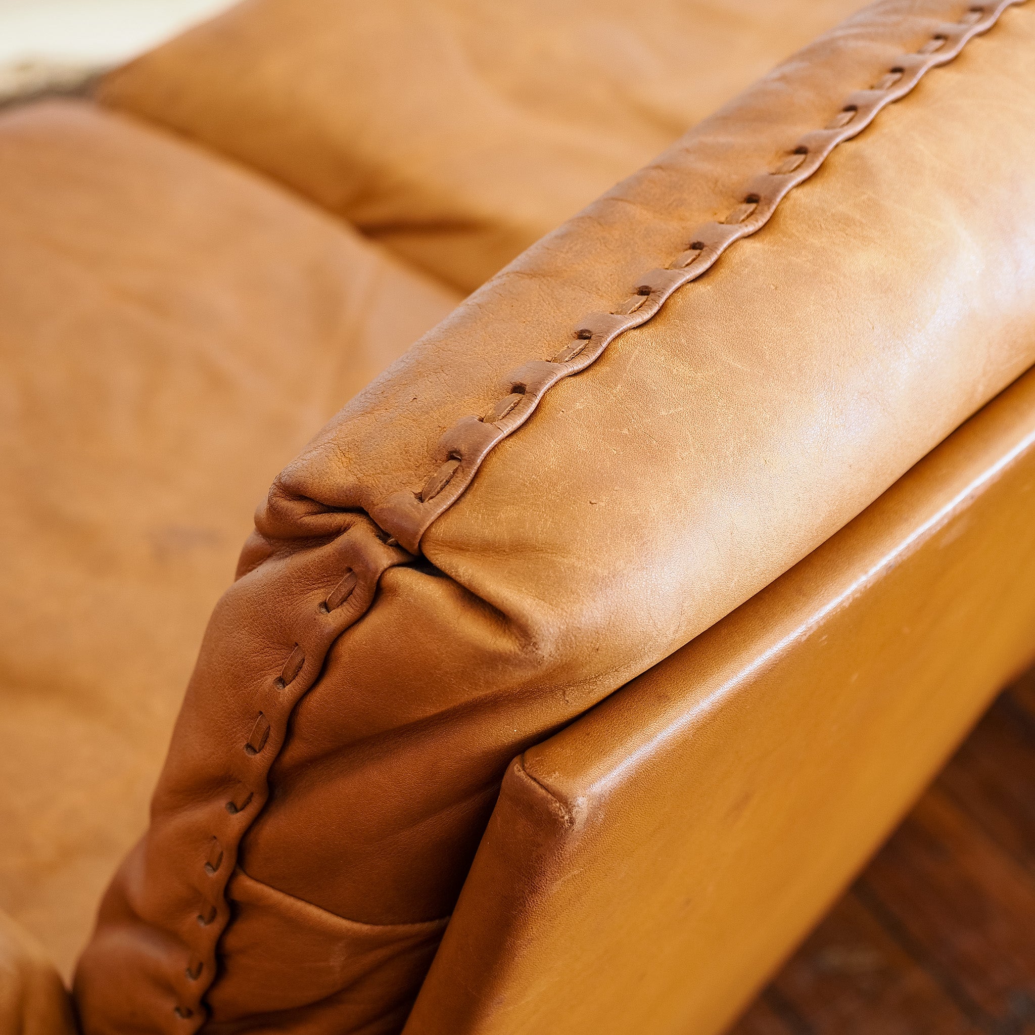 Leather detail cushion